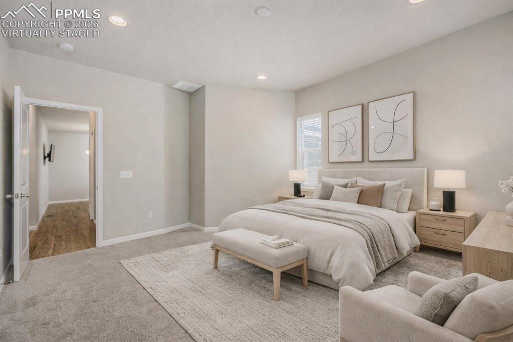 Image 19 of 33: Virtually Staged Primary Bedroom 