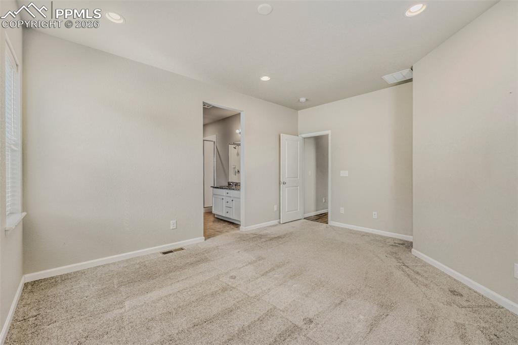 Image 21 of 33: Master Bedroom