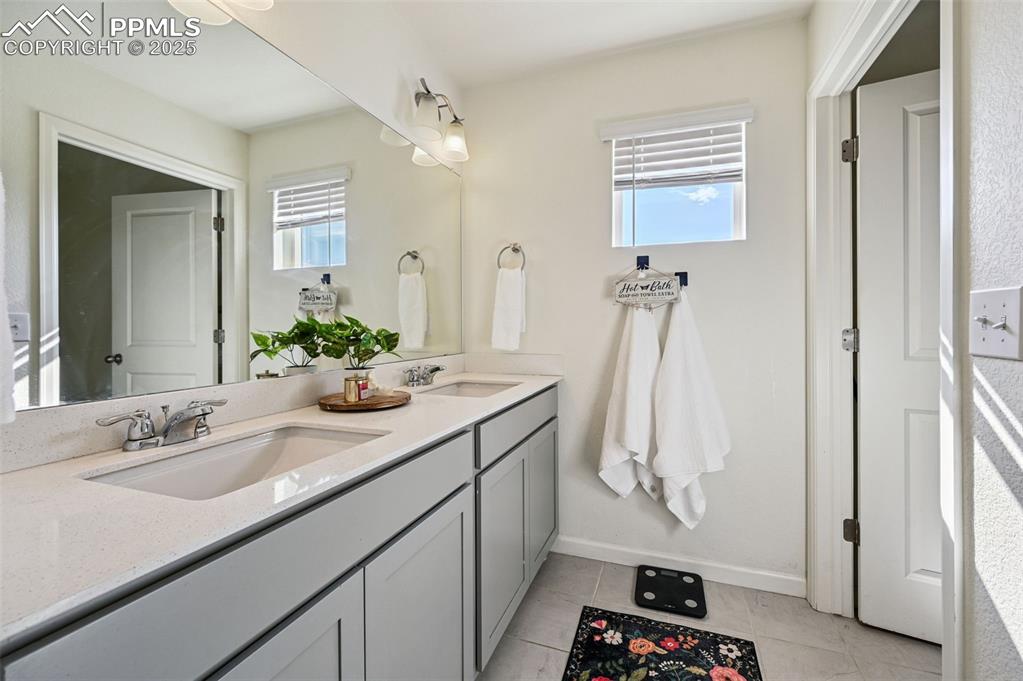 Image 26 of 32: Full Bathroom featuring double vanity