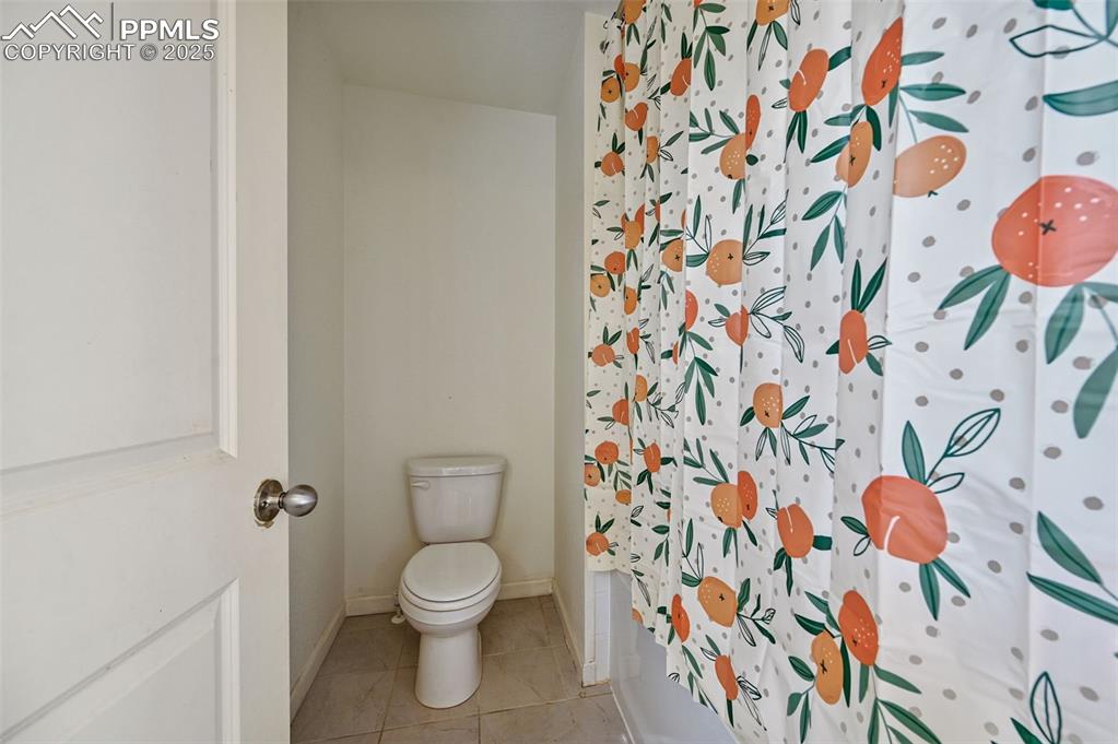 Image 27 of 32: full Bathroom: shower and tub combo.