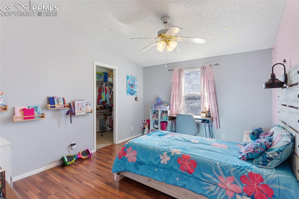 Image 23 of 36: Bedroom 1 w/ walk-in closet