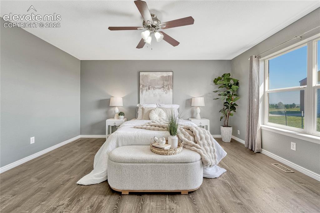 Image 15 of 39: Primary suite with luxury vinyl flooring...