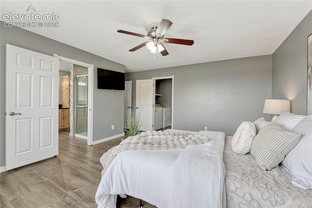 Image 19 of 39: Primary bedroom also has...