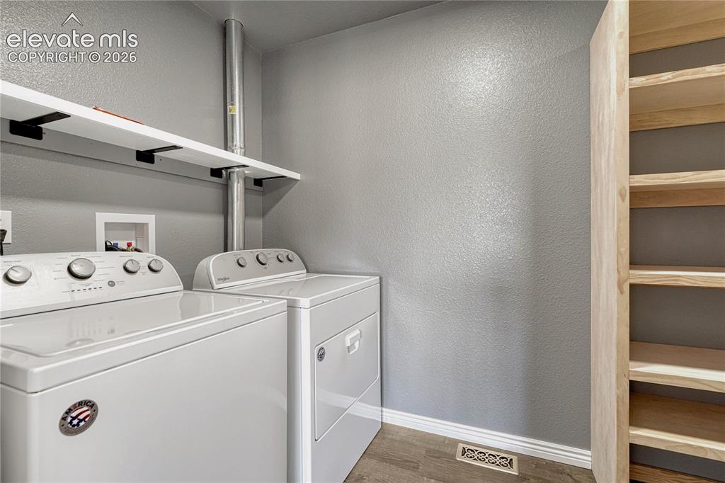 Image 20 of 39: ...walk-in closet and laundry. Washer and dryer included. 
