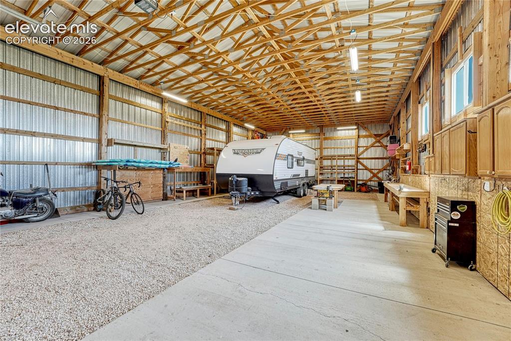 Image 35 of 39: Outbuilding has 50-amp RV outlet, 15