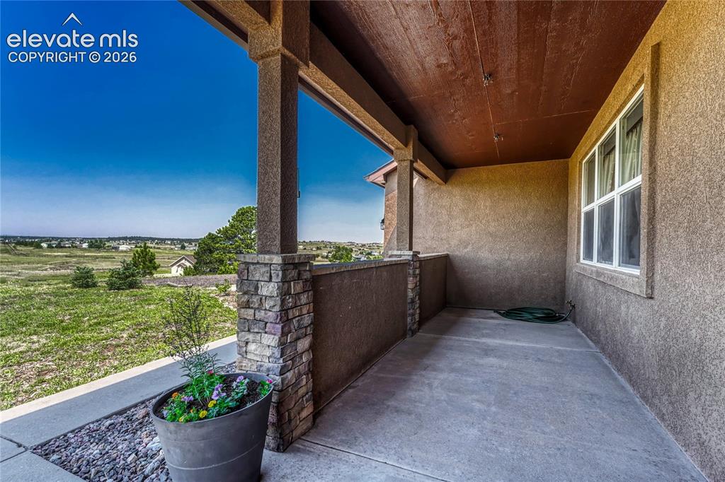 Image 4 of 39: Enter from the covered front porch...