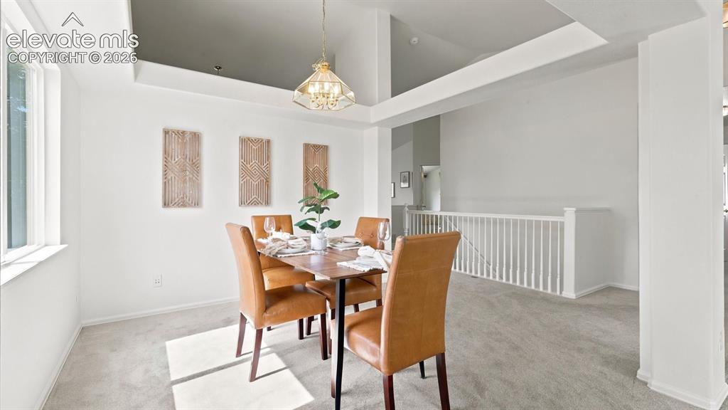 Image 11 of 46: Natural sunlight fills the Dining Area.