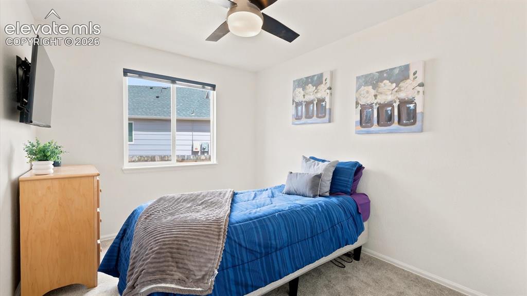 Image 15 of 46: The Laundry Room has a built in shelf and front loading washer/dryer that i