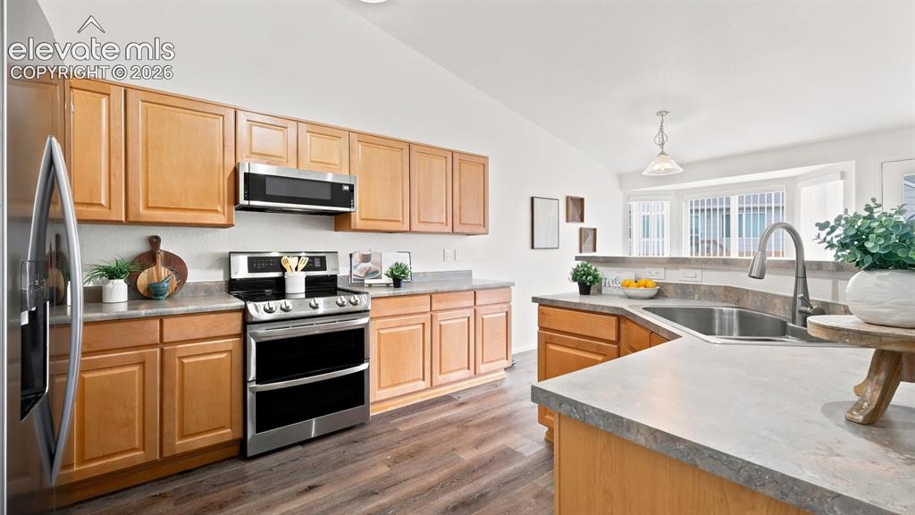 Image 27 of 46: The Breakfast Nook is located off the Kitchen for casual meals and morning 