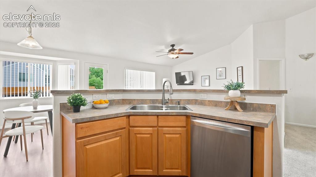 Image 28 of 46: The Breakfast Nook features a bay window with window blinds.