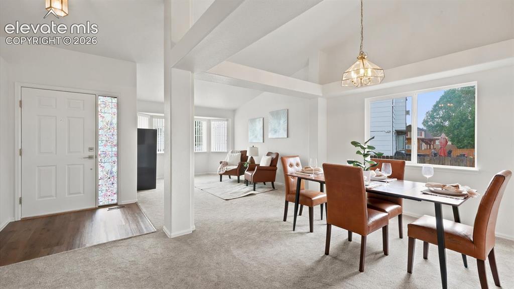 Image 8 of 46: View of the Living Room and Front Entry.