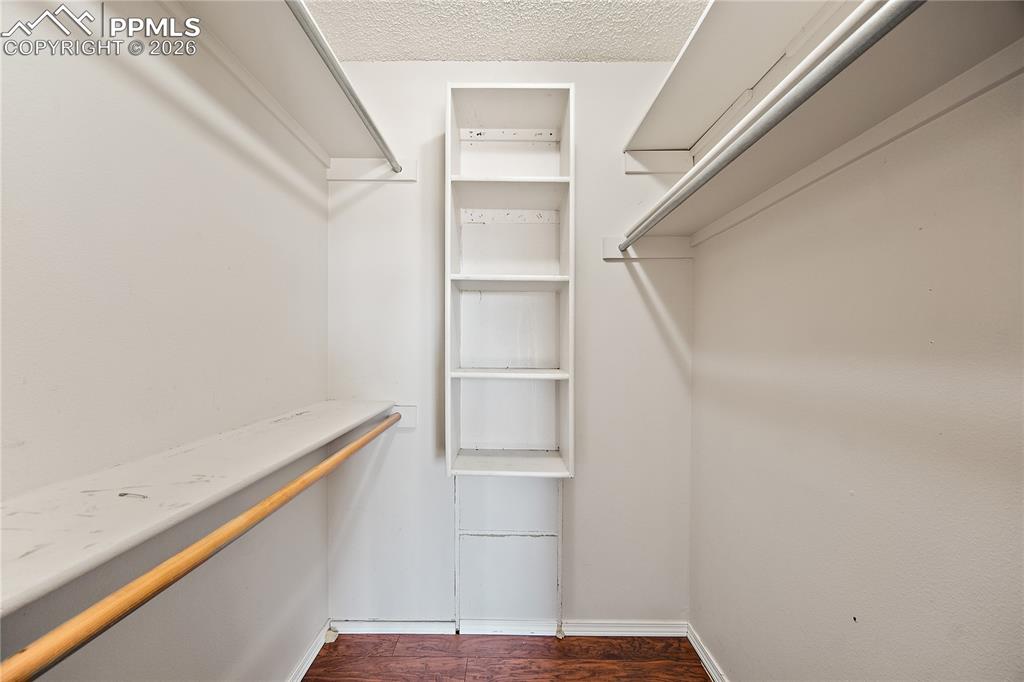 Image 27 of 40: Walk in closet