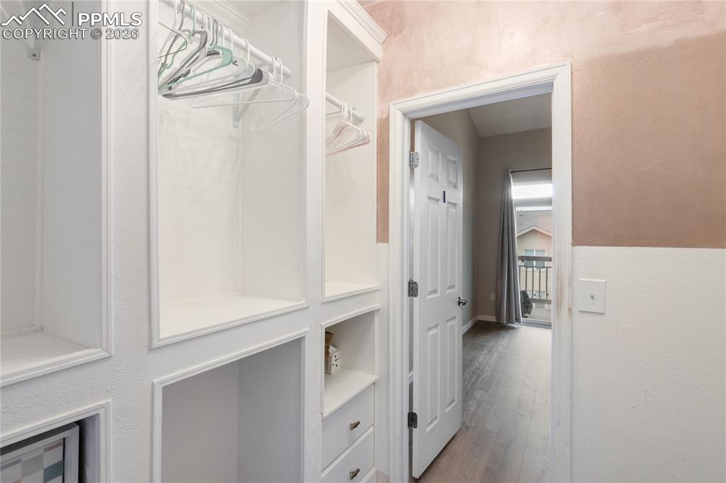 Image 26 of 35: Primary Closet