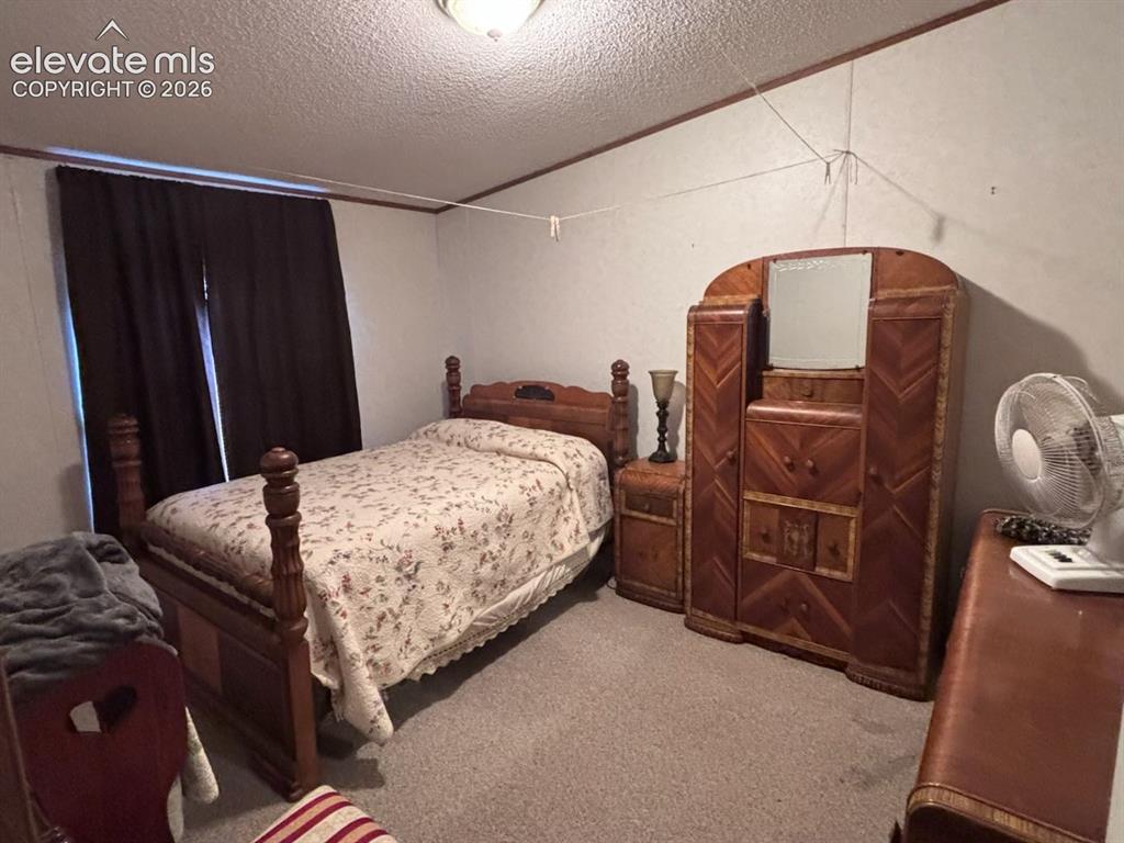 Image 14 of 19: Bedroom
