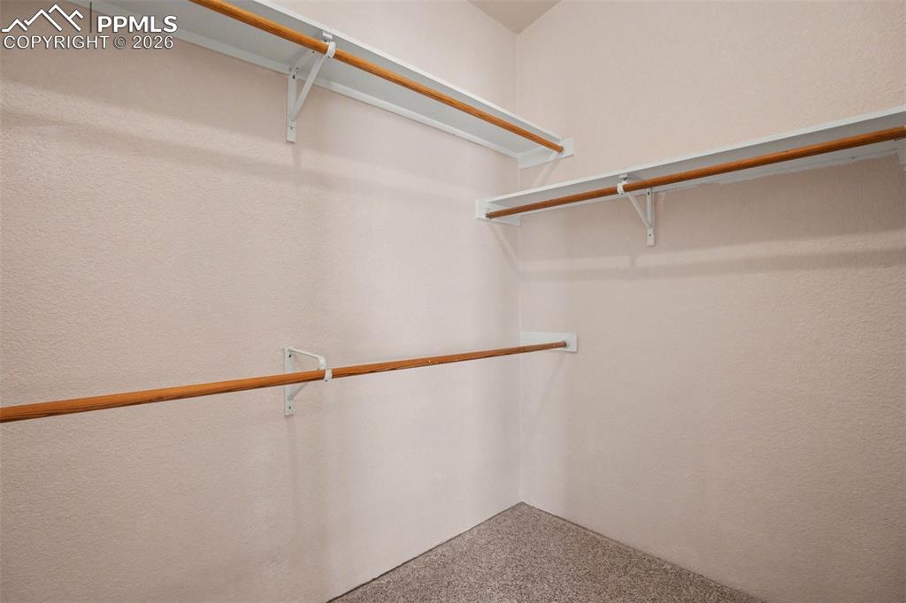 Image 14 of 27: Spacious walk-in closet offering ample storage