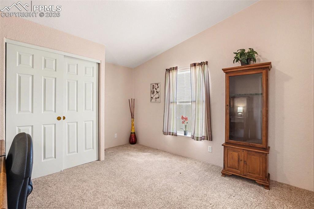 Image 17 of 27: Flexible third bedroom that can serve as a guest room or office