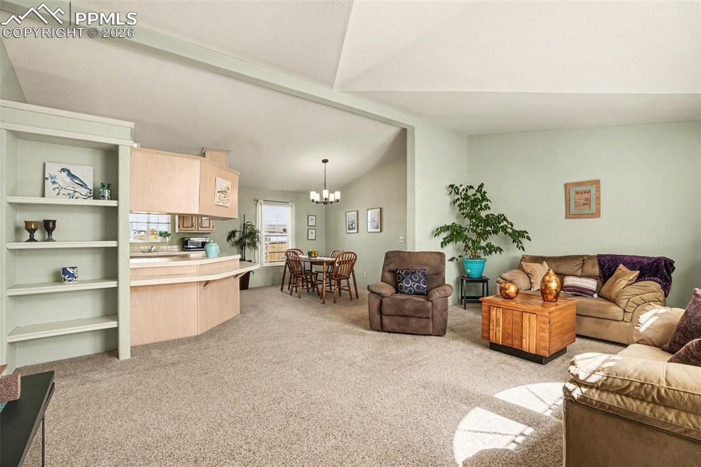 Image 6 of 27: Built-in bookcases in the living room that add both charm and functionality