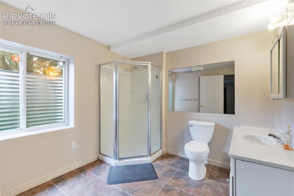 Image 20 of 32: Basement Bath