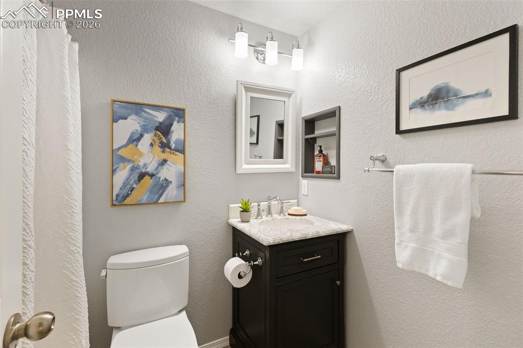 Image 26 of 44: Full bathroom on main level.