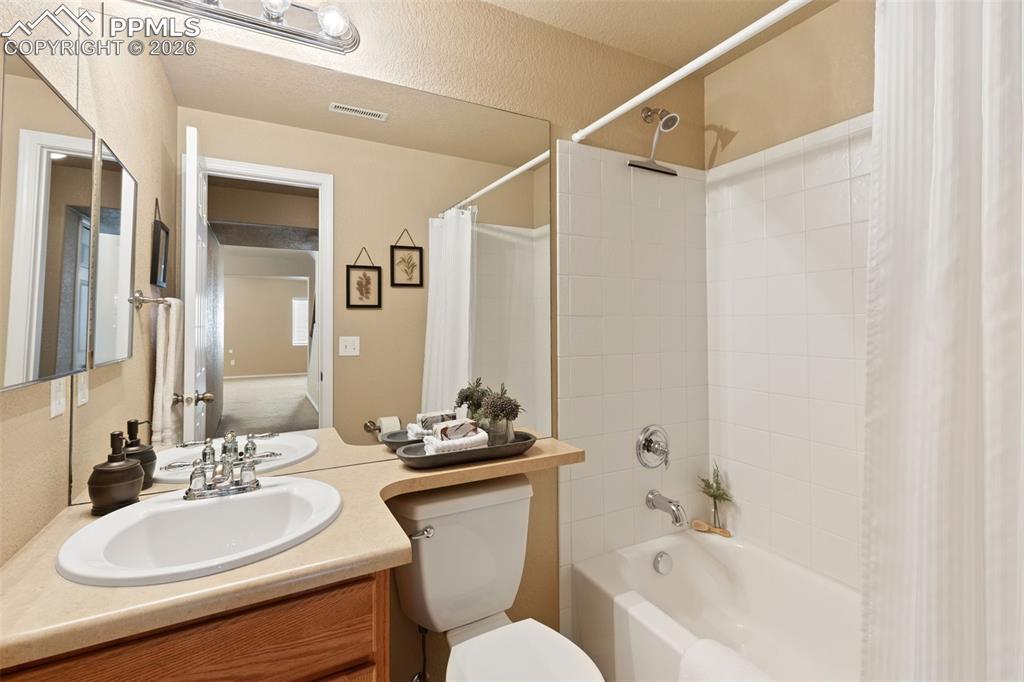 Image 33 of 44: Full bathroom in basement.