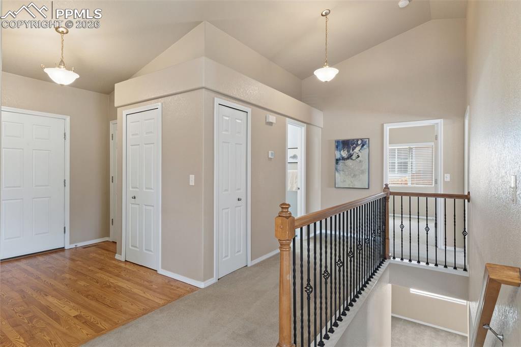 Image 6 of 44: Secondary view of entry and view of stairs going down into finished basemen