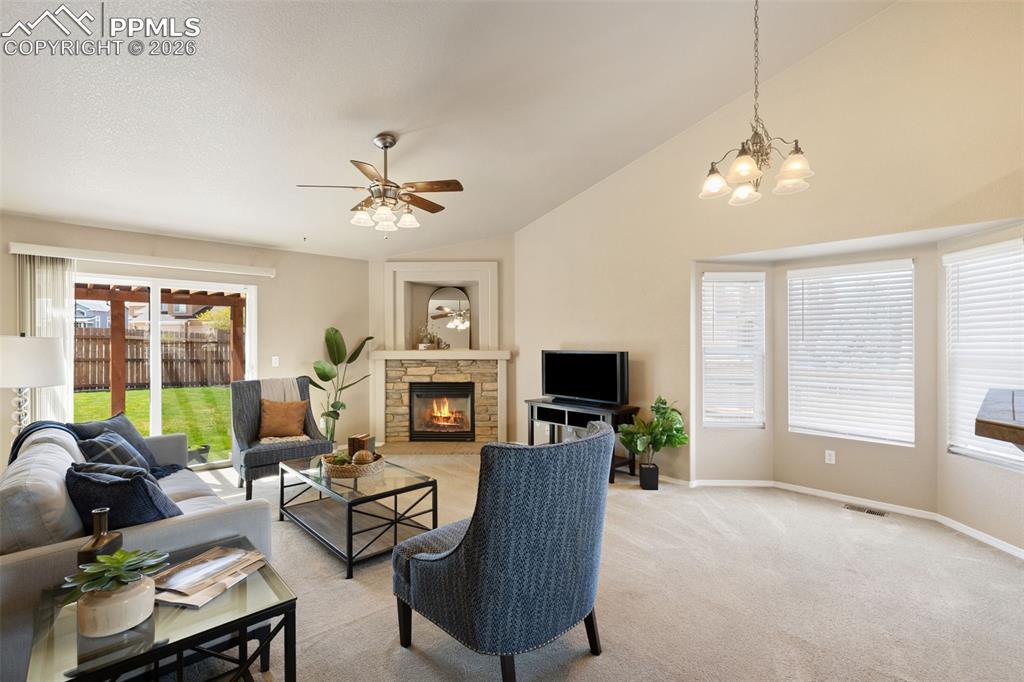 Image 9 of 44: Living room with view of dining area.