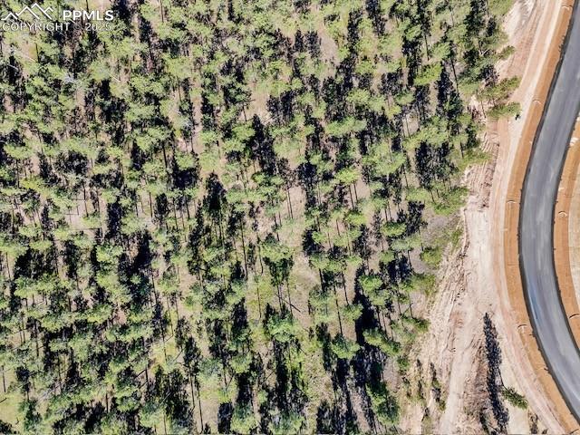 Image 4 of 6: Aerial view of property and surrounding area
