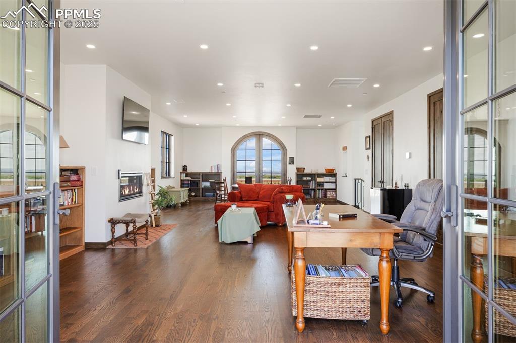 Image 17 of 36: The crow’s nest is a versatile space ideal for an office, additional living