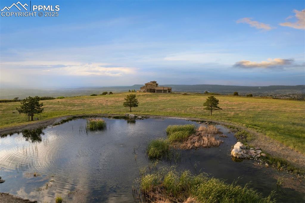 Image 34 of 36: Set on 35 acres atop a secluded mesa with dynamic topography and a private 