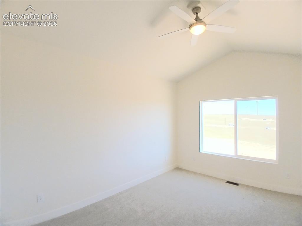 Image 14 of 33: Vaulted Ceiling in Main Bedroom