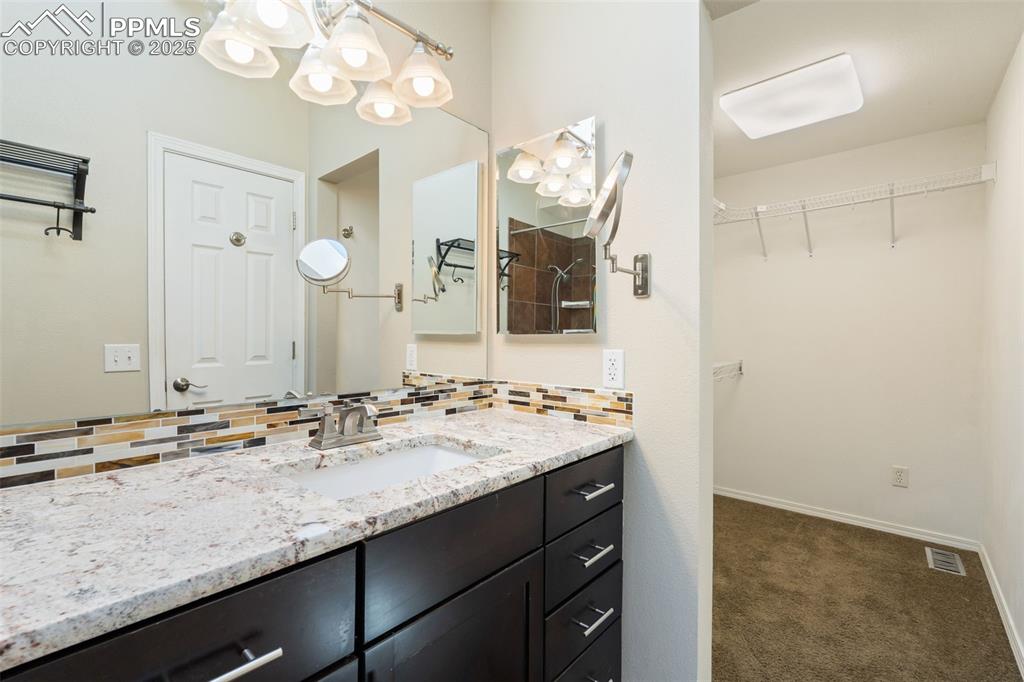 Image 23 of 49: Master Bathroom