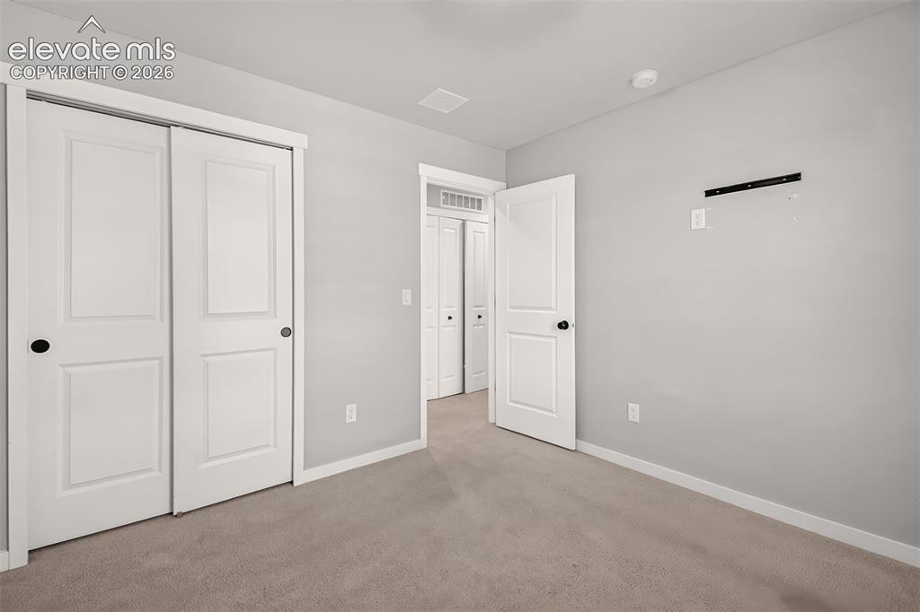 Image 15 of 36: Bedroom
