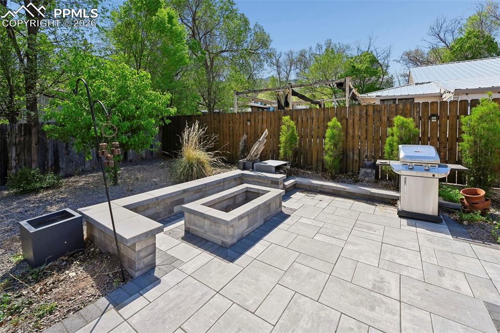 Image 30 of 40: private inviting back patio