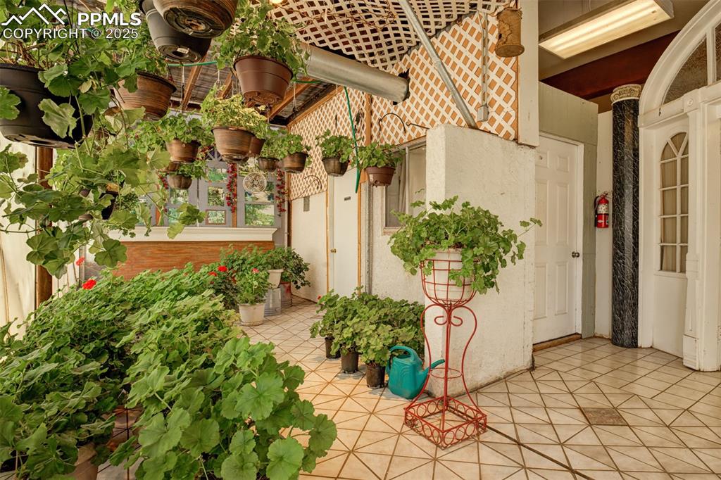Image 11 of 45: Secret Garden: Greenhouse, storage, bathroom 1