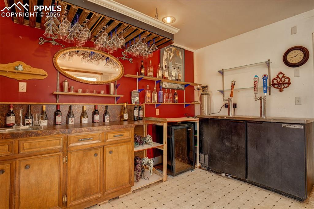 Image 17 of 45: Secret Garden: Bar Hut - Taps with beer refrigeration for multiple kegs