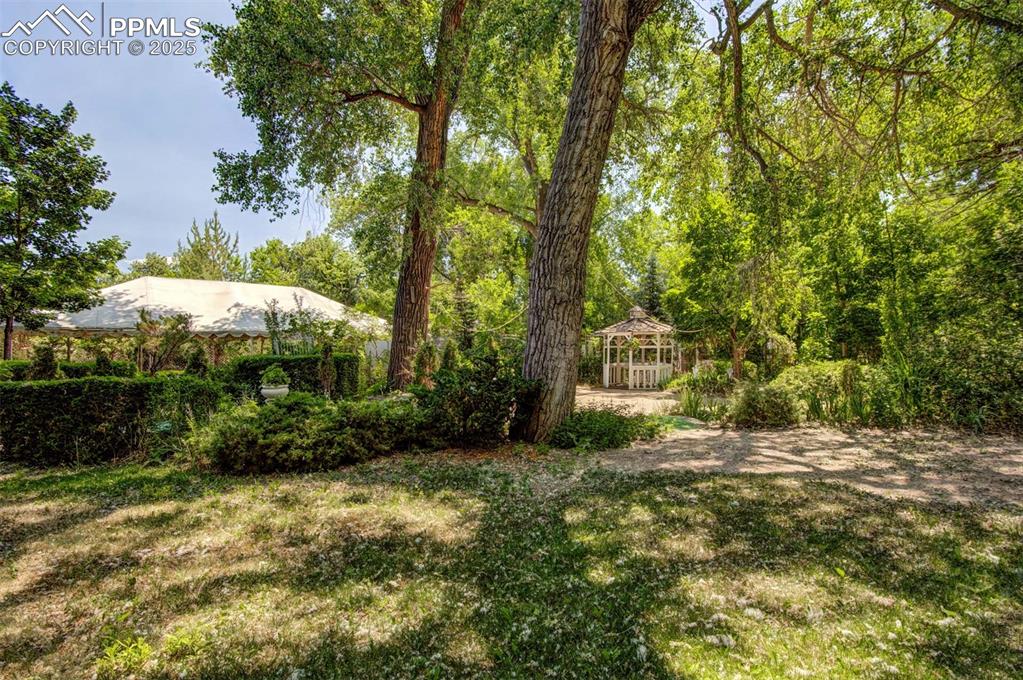 Image 29 of 45: Secret Garden: Gazebo and Reception Area