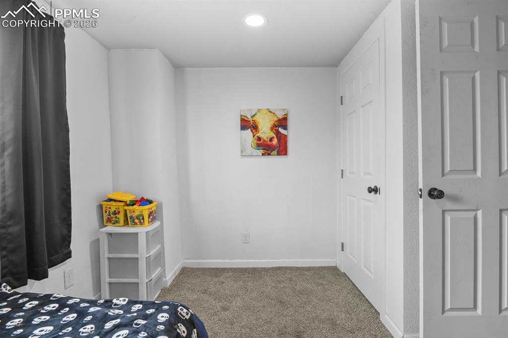 Image 22 of 26: Bedroom