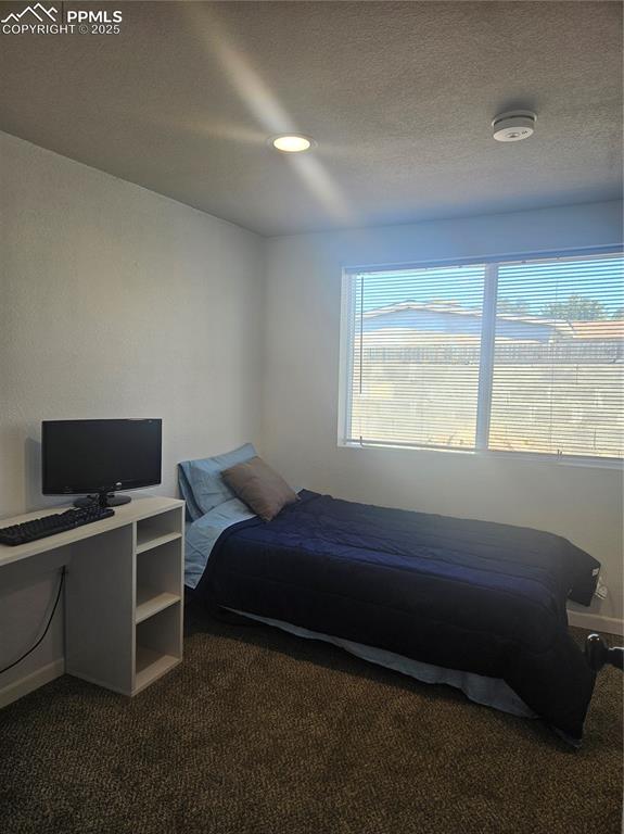 Image 6 of 13: Bedroom