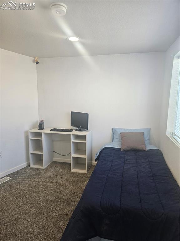 Image 8 of 13: Bedroom