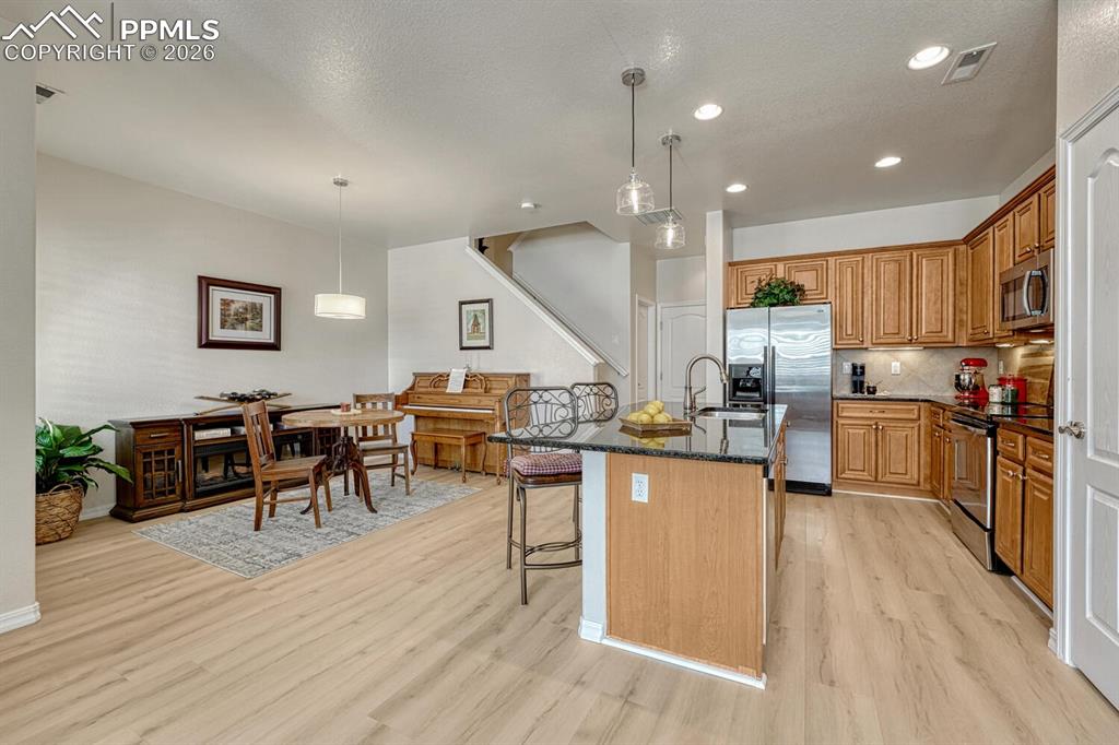 Image 15 of 50: New LVP flooring throughout the home!