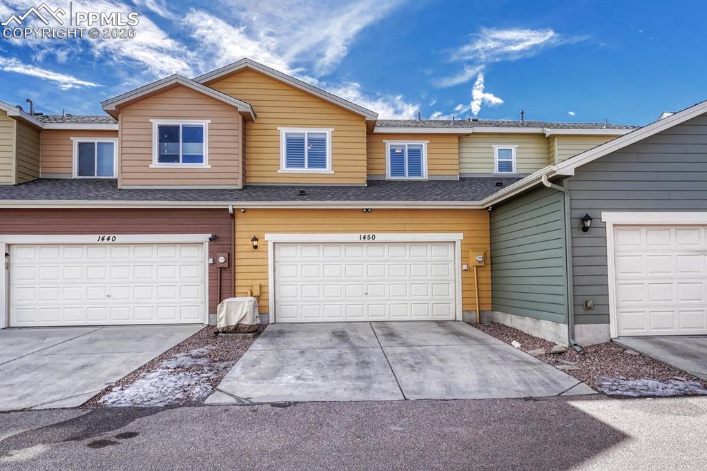 Image 38 of 50: Driveway with alley access