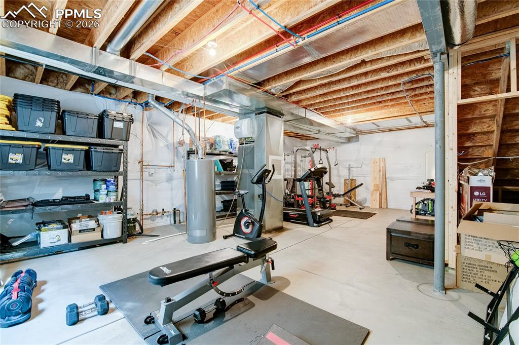 Image 37 of 44: Unfinished room utility room in basement used as an exercise room