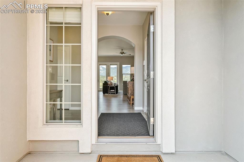 Image 6 of 50: Elegant Entrance with Covered Porch
