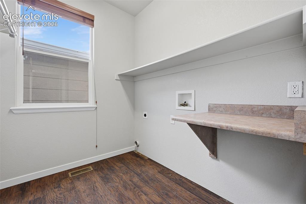 Image 14 of 32: Main Level Laundry Room