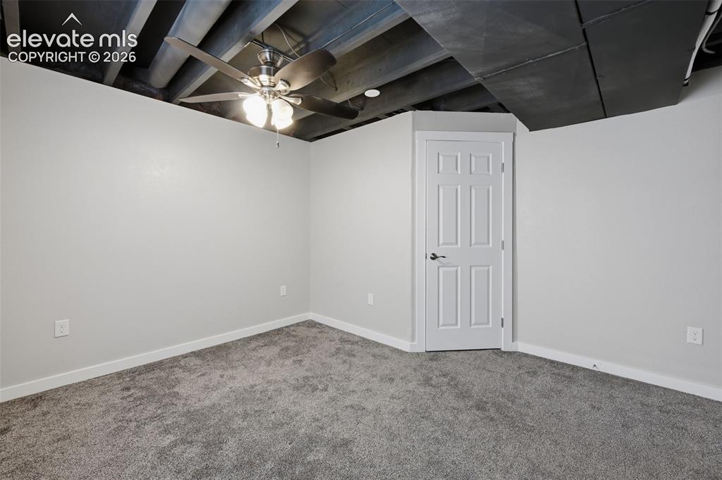 Image 24 of 32: Basement Bedroom with Ensuite Bath