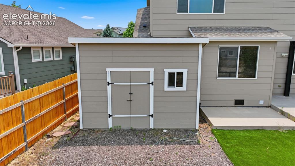 Image 31 of 32: Back Yard Storage Shed