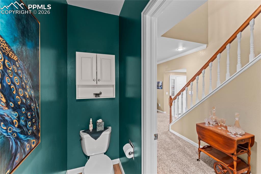 Image 17 of 48: Main level half bath