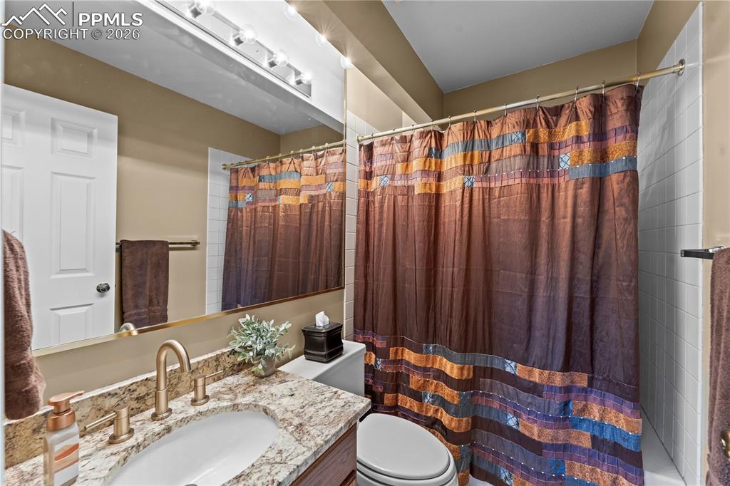 Image 29 of 48: Full bath is attached to the second bedroom