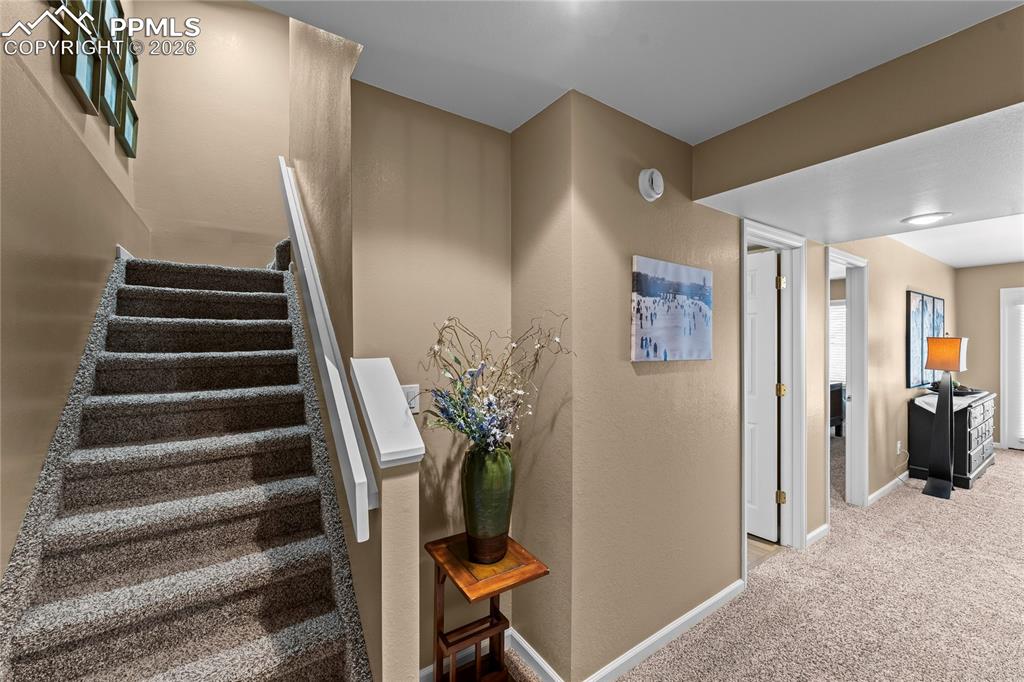 Image 31 of 48: Stairs to the basement level