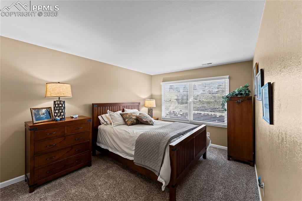 Image 36 of 48: Basement bedroom